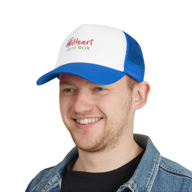A man wearing a blue and white trucker hat with Printify's iHeartFruitBox Branded Mesh Cap logo.