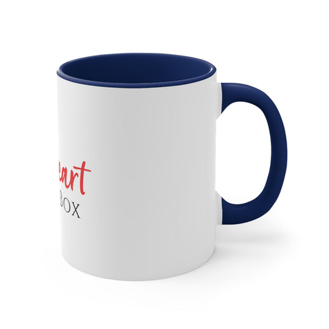 A blue and white iHeartFruitBox Coffee Mug, 11oz with the words i love the box on it, featuring organic tropical fruit, by Printify.