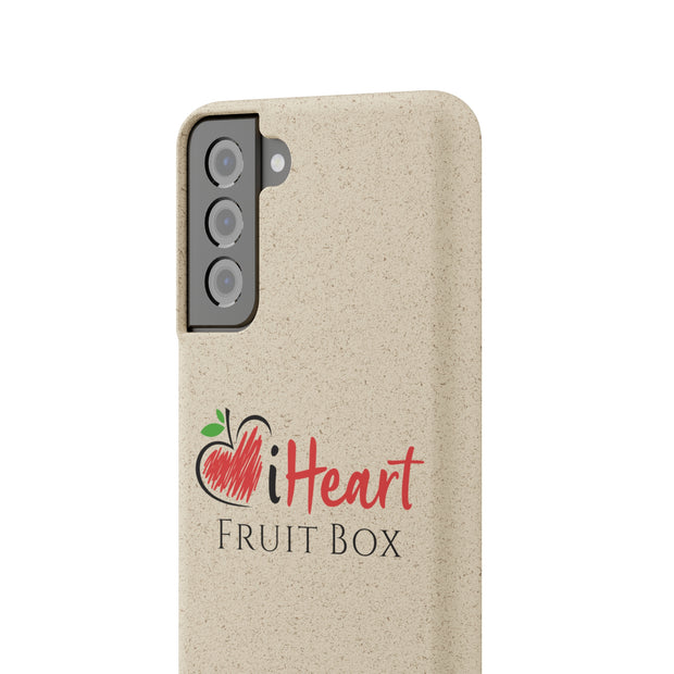 A white iHeartFruitBox Biodegradable Phone Case with three cameras featuring tropical fruit by Printify.