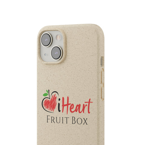 The iHeartFruitBox Biodegradable Phone Case adorned with tropical fruit is presented on a beige background.