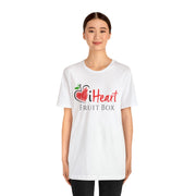 A woman wearing a white iHeartFruitBox Fitted Unisex T-Shirt by Printify.