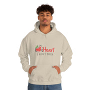 A man wearing a Printify unisex hoodie with the word fruit and "iHeartFruitBox".