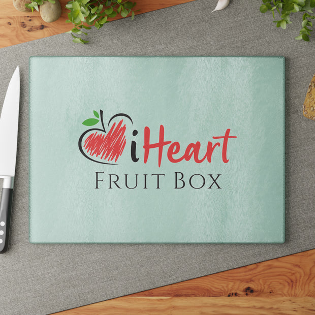 The iHeartFruitBox Glass Cutting Board by Printify is perfect for all fruit lovers. Made from organically grown materials, this cutting board is designed specifically for prepping tropical fruits.