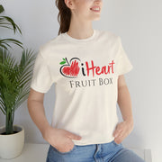 The Printify iHeartFruitBox Fitted Unisex T-Shirts feature a vibrant design inspired by tropical fruit and are made with organically grown materials.