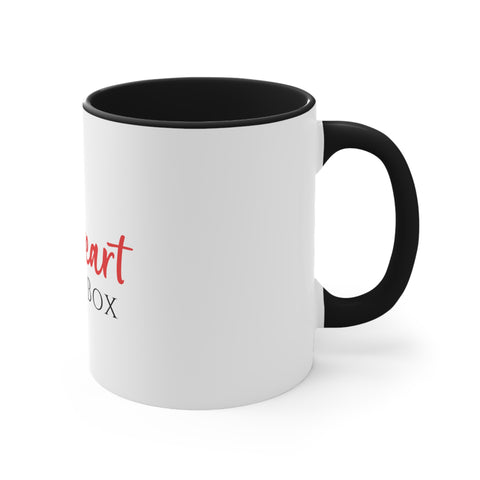 A black and white iHeartFruitBox Coffee Mug, 11oz with the words i love the box on it, representing our passion for Organically Grown fruit. Produced by Printify.