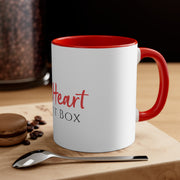 An iHeartFruitBox coffee mug with the word "heart" in the box on it, called the Printify iHeartFruitBox Coffee Mug, 11oz.