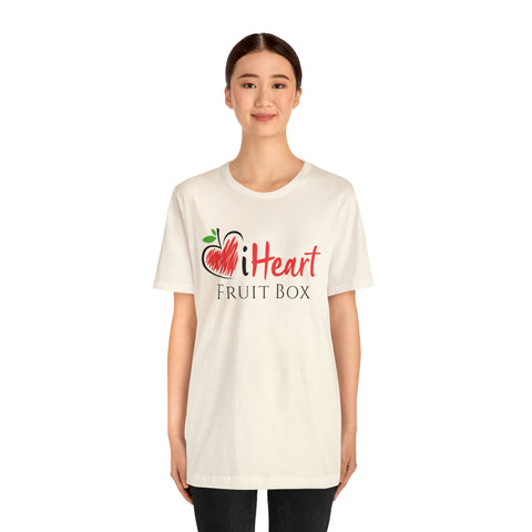 A woman wearing a white shirt enjoying iHeartFruitBox Fitted Unisex T-Shirts by Printify.